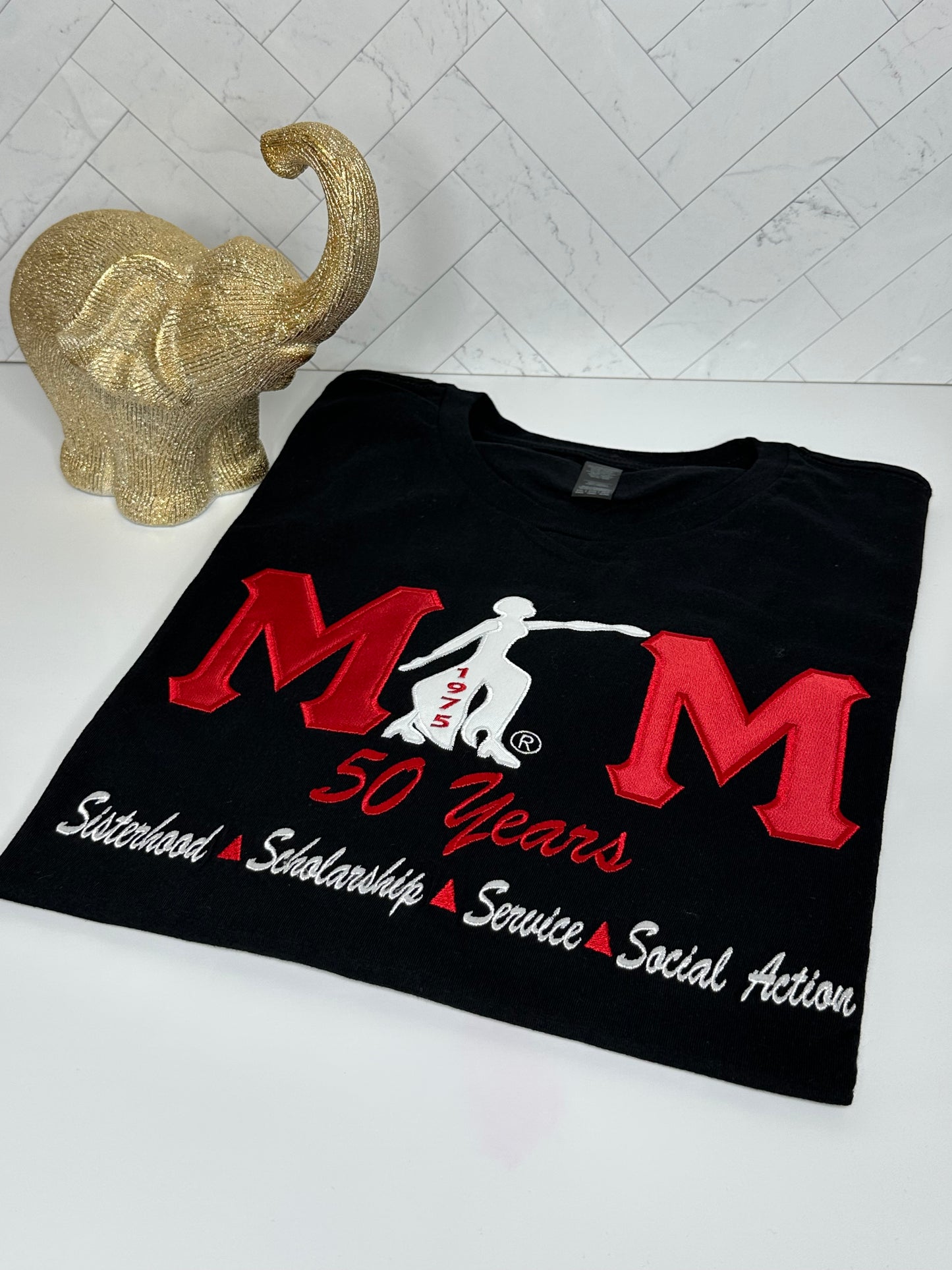 Mu Mu 50 Years with Lady of Fortitude