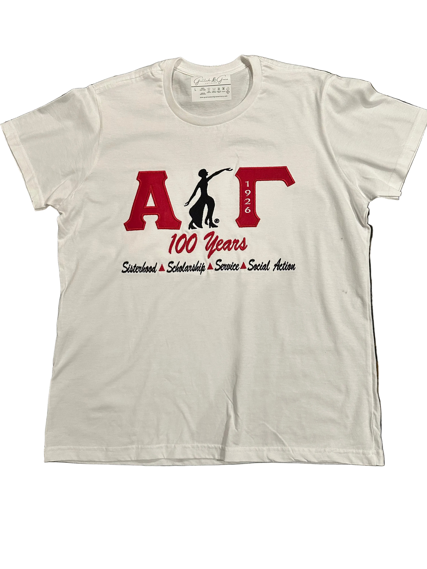The Official Alpha Gamma 100 Years with Lady of Fortitude Ladies Embroidered T-Shirt