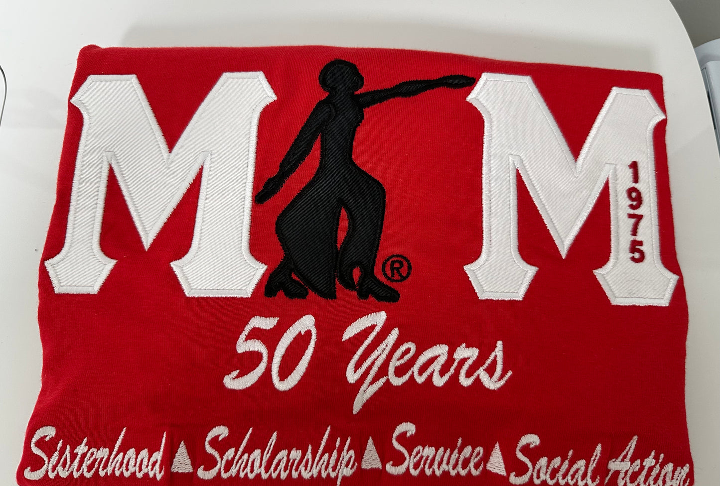 Mu Mu 50 Years with Lady of Fortitude